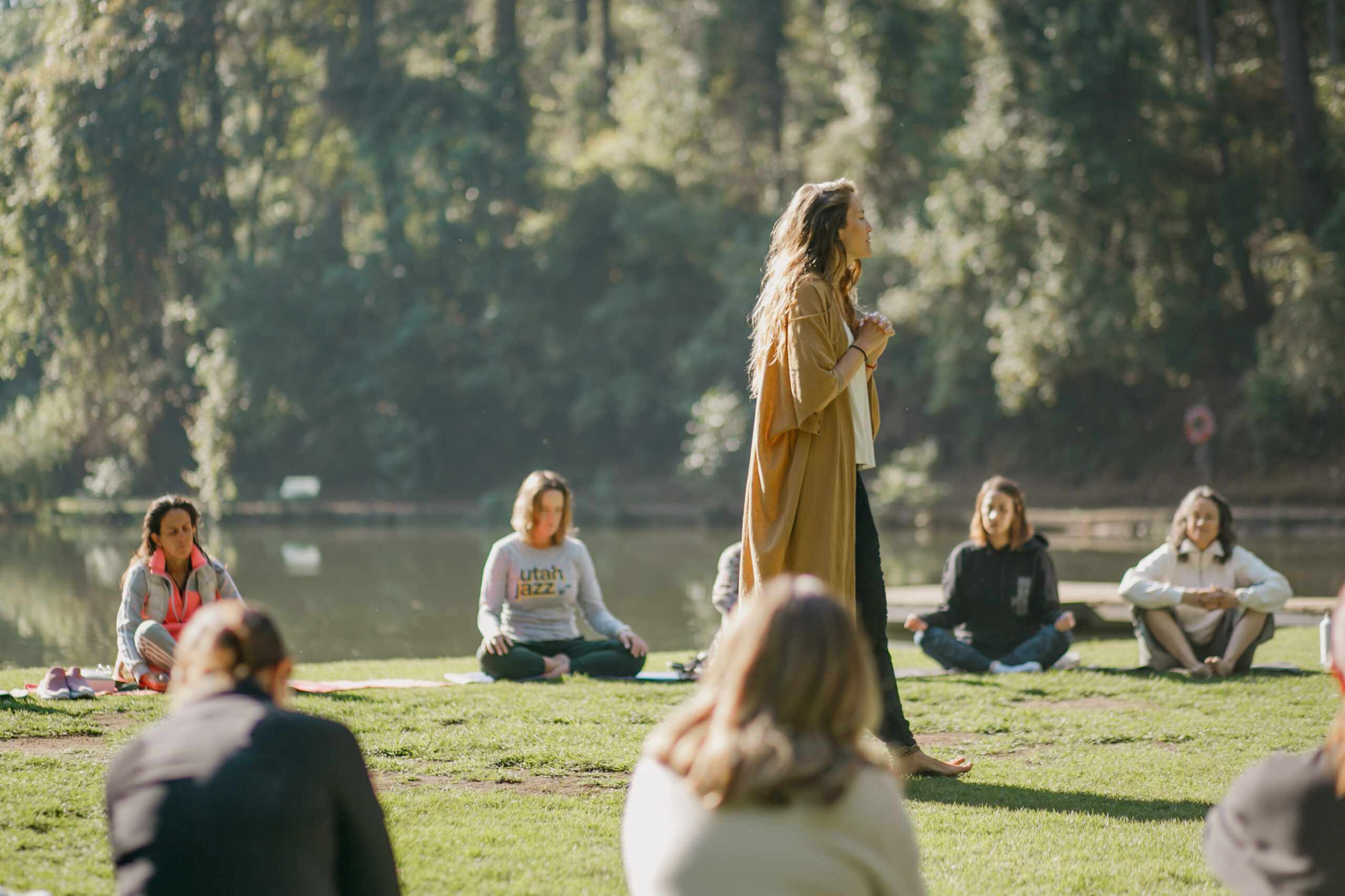 Outdoor meditation session by the lake